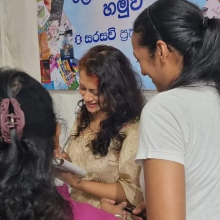 Tharaka Wasalamudaliarachchi signing autographs for her Fans